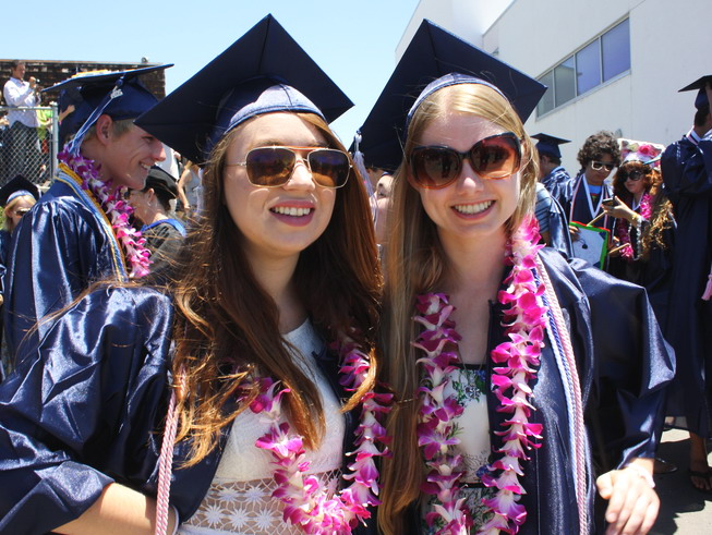 Alumnis Jill Pickrell and Kathryn Chapman wait for the ceremony to start. Kathryn-Jill