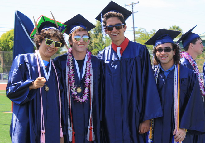 Students wait in line to walk down the aisle. pose