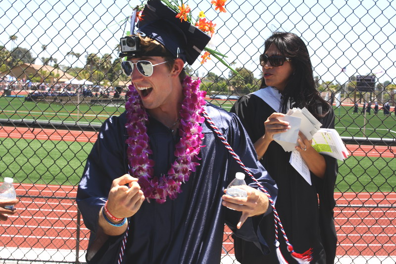 Alumni Powers Berry wears a Go-Pro leaving the tennis courts. powers