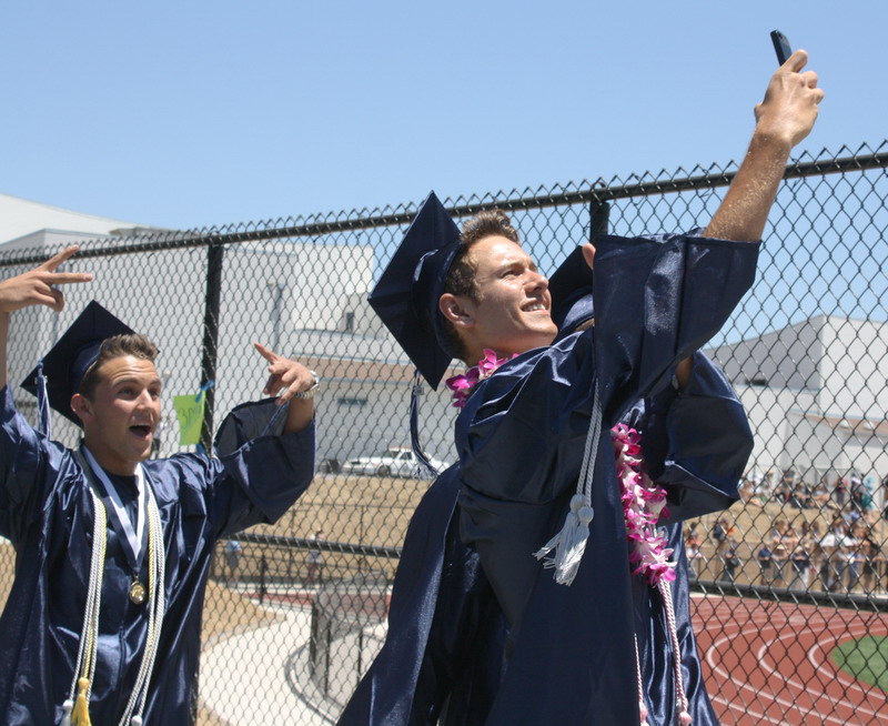 Alumin Jacob Gonzalez takes a selfie while leaving the tennis courts. selfie