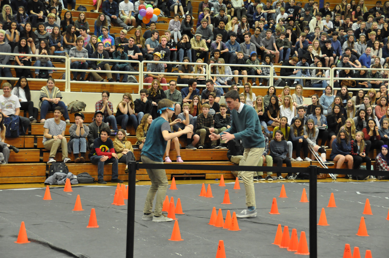 Students and teachers participate in a relay race 12