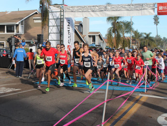 Runners take off from the starting line.