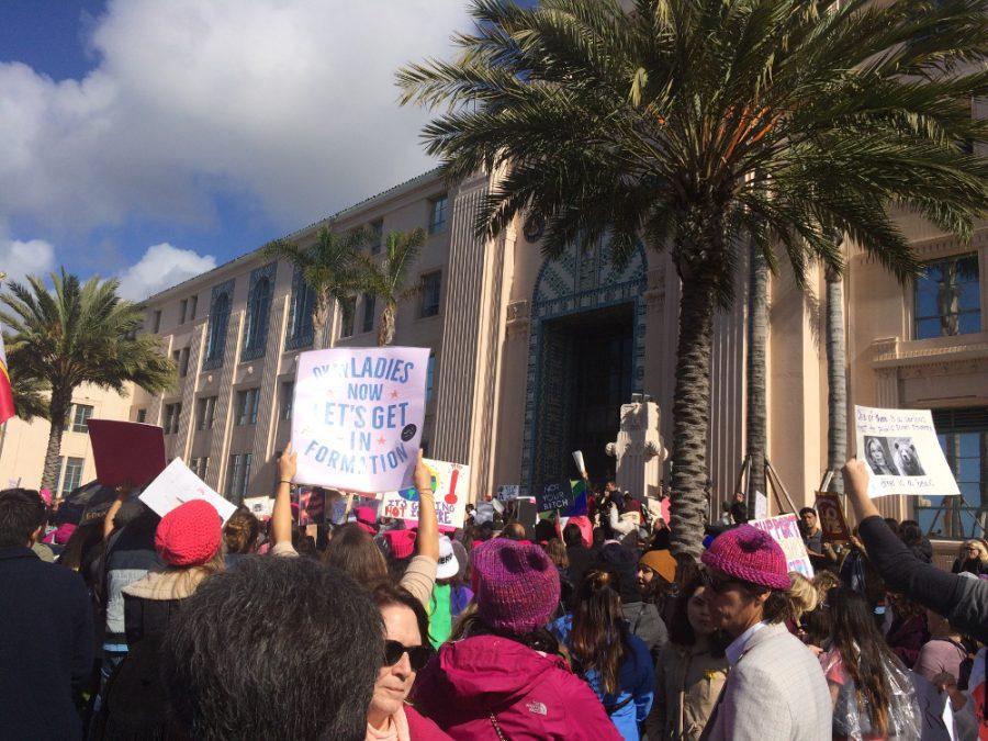 The+crowd+stands+in+front+of+the+County+Administration+Center+during+the+San+Diego+Womens+March+on+Jan.+21.