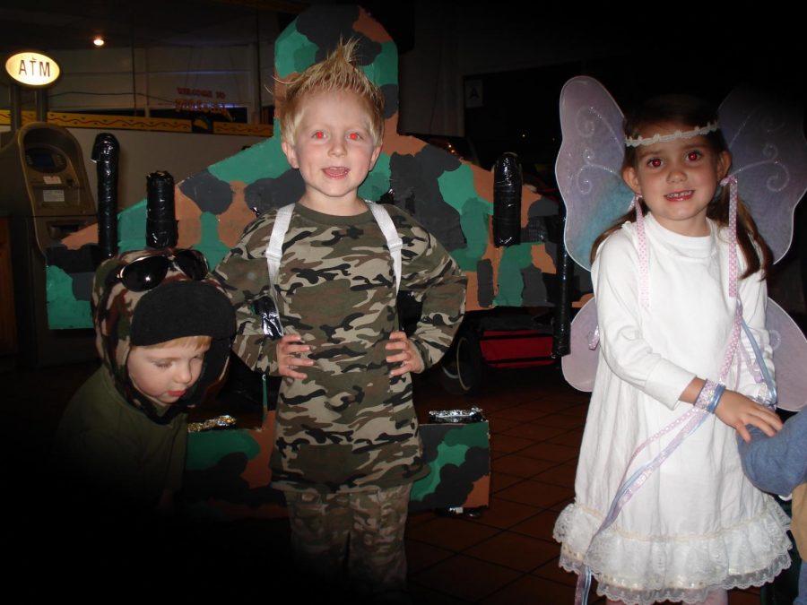 Devlin Ott (right) always had DIY Halloween costumes as a kid, unlike the shoppers at Party City