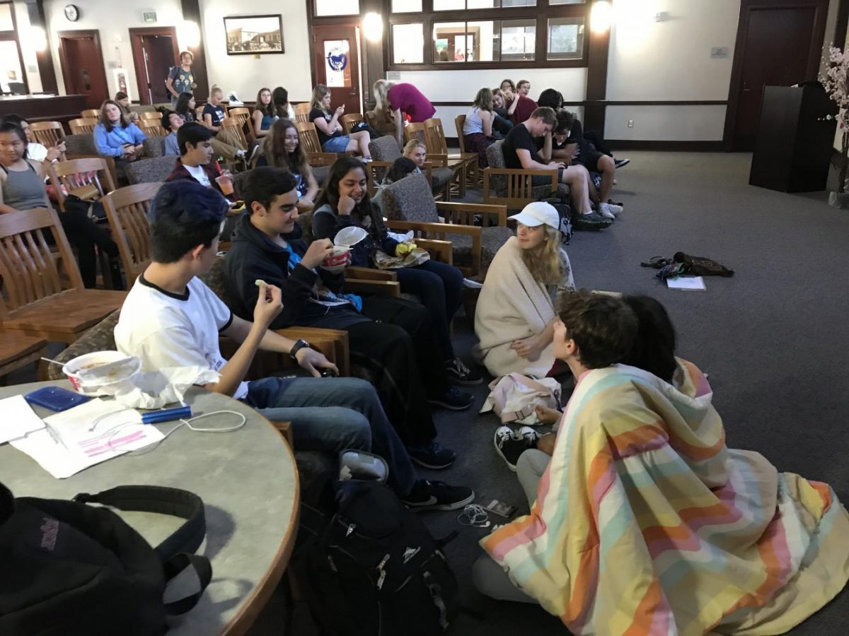 Students watched the film intently while enjoying their boba, lo mein, rice cakes, and ramune.