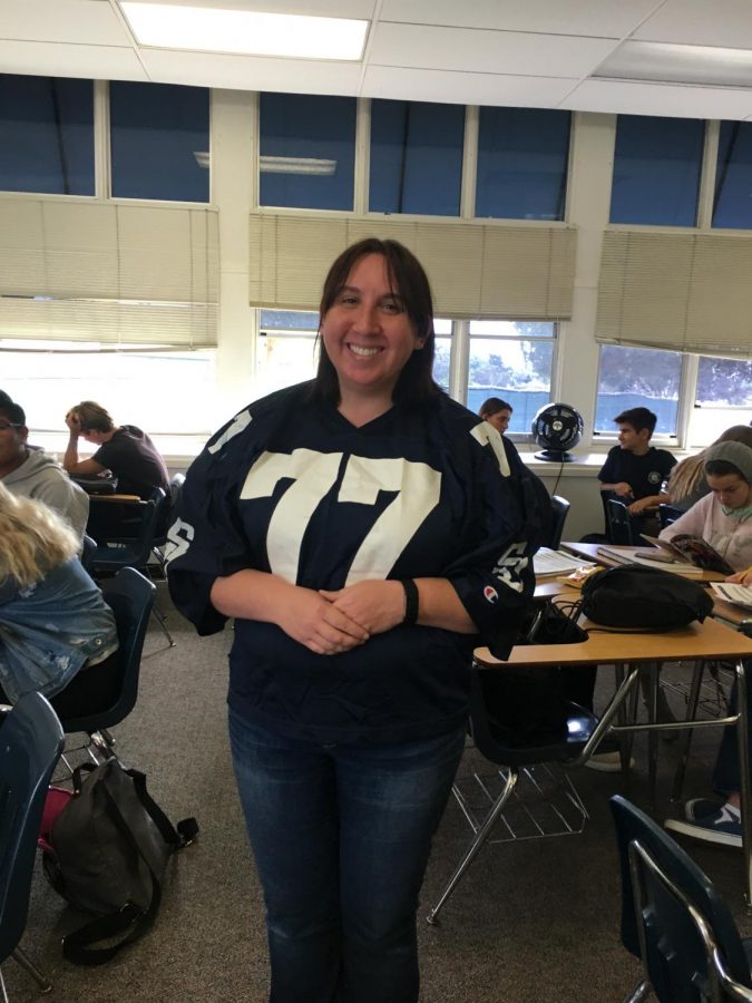 English teacher Amanda Bevers gets ready for the flag football game.