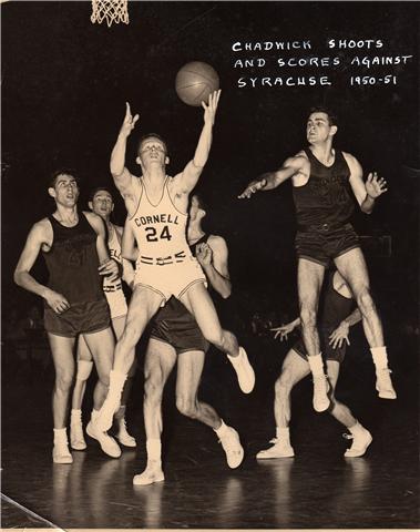 Old photo of Roger Chadwick making one of many college basketball shots.