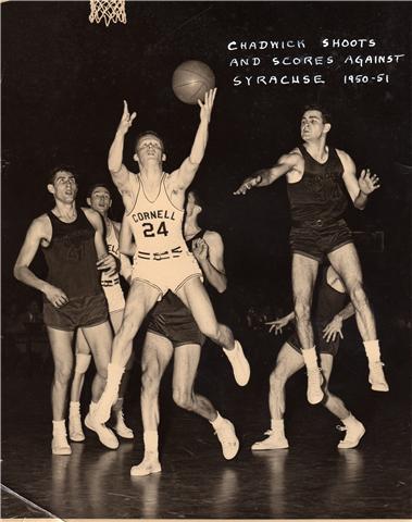 Old photo of Roger Chadwick making one of many college basketball shots.  