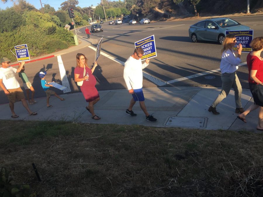 Many cars honked their support as they drove by.