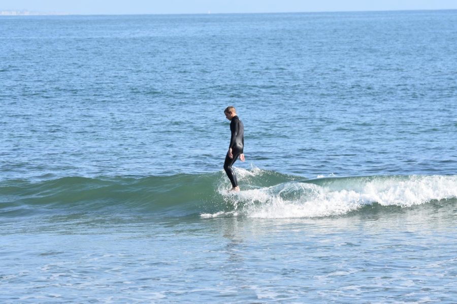 Senior Jack Butler competes in Sundays surf contest.