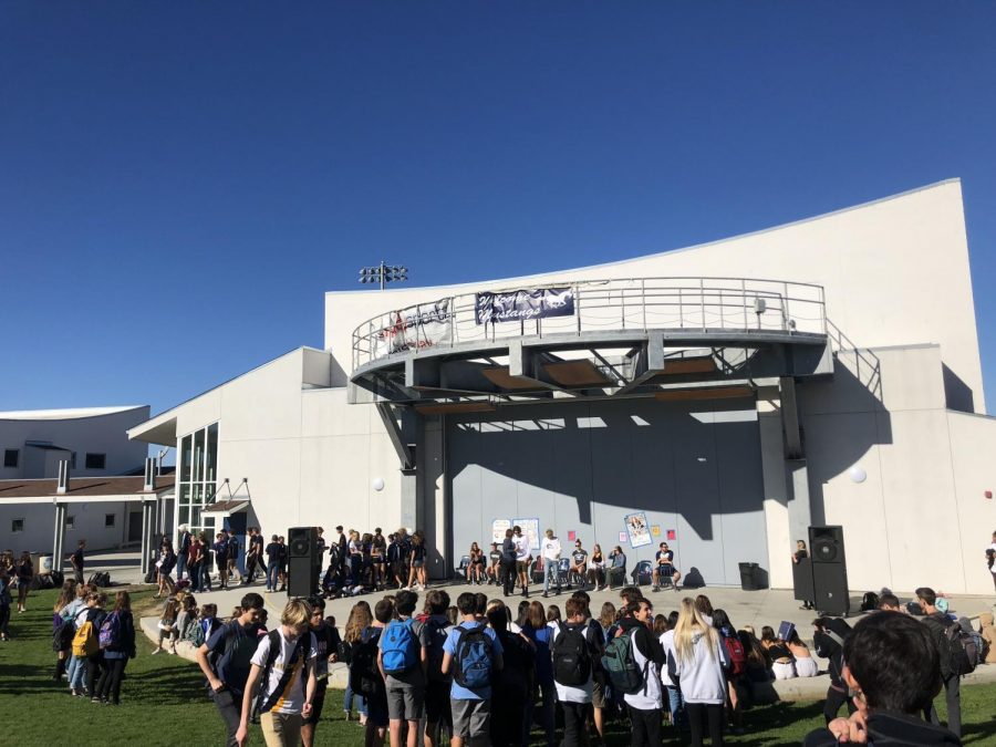 Students gathered outside the PAC during homeroom for a pep rally.