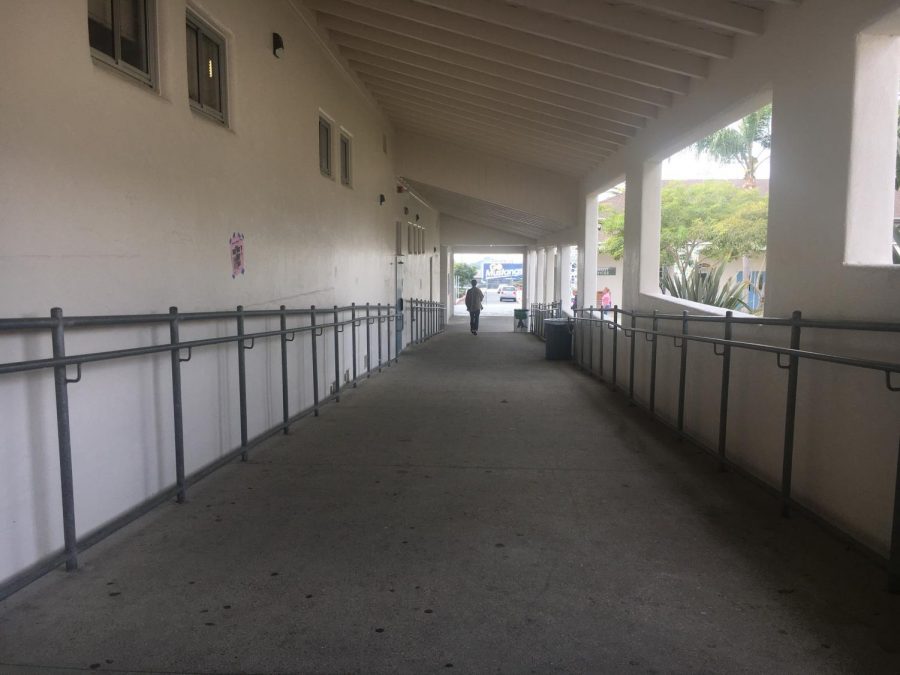 A student walking around the halls in 4th period. After hour lunch last week, staff swept the campus and gave every late student a detention.