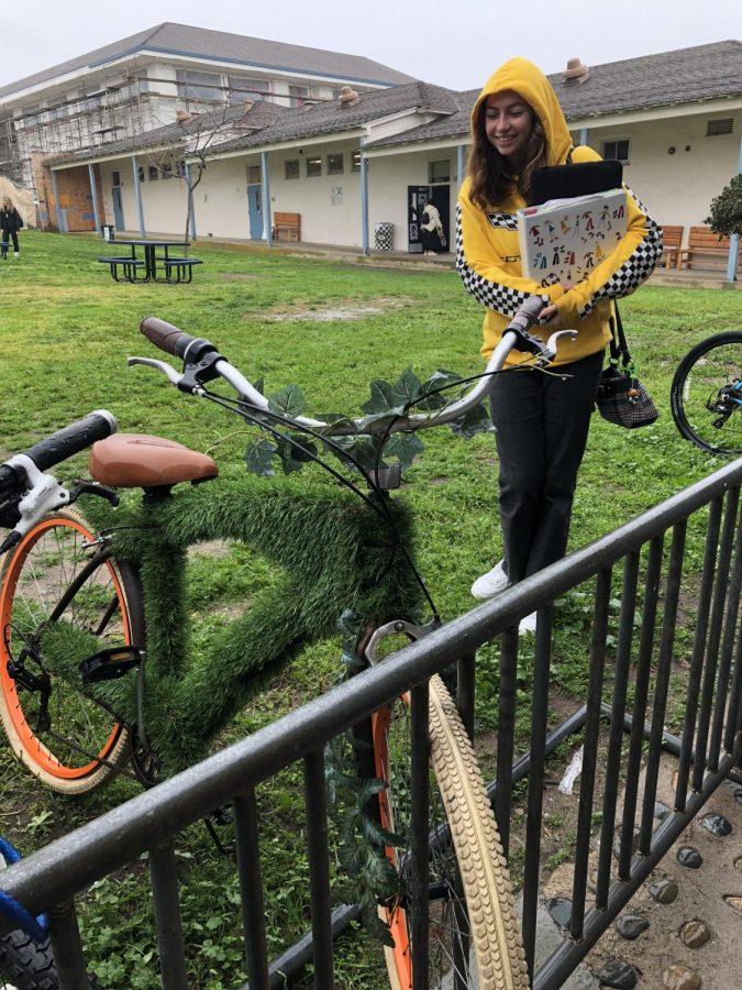 Sophomore Shayna Dumont admires the bike she happened to stumble upon yesterday morning.