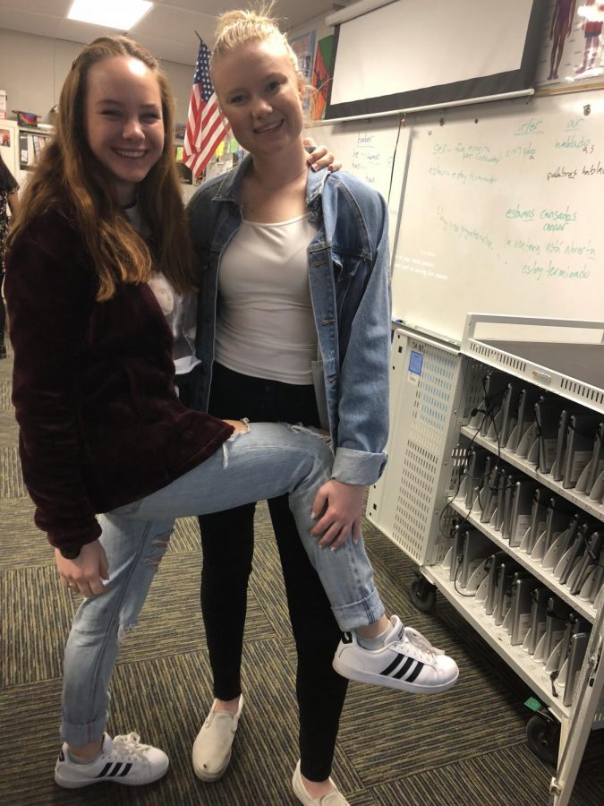 Seniors Gabby and Cami wear denim for denim and donuts day. 