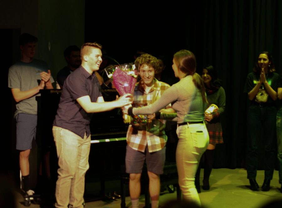 Senior Caeden Schlosser (left) and junior Tyler Brown (right) receiving first place for their air drum performance