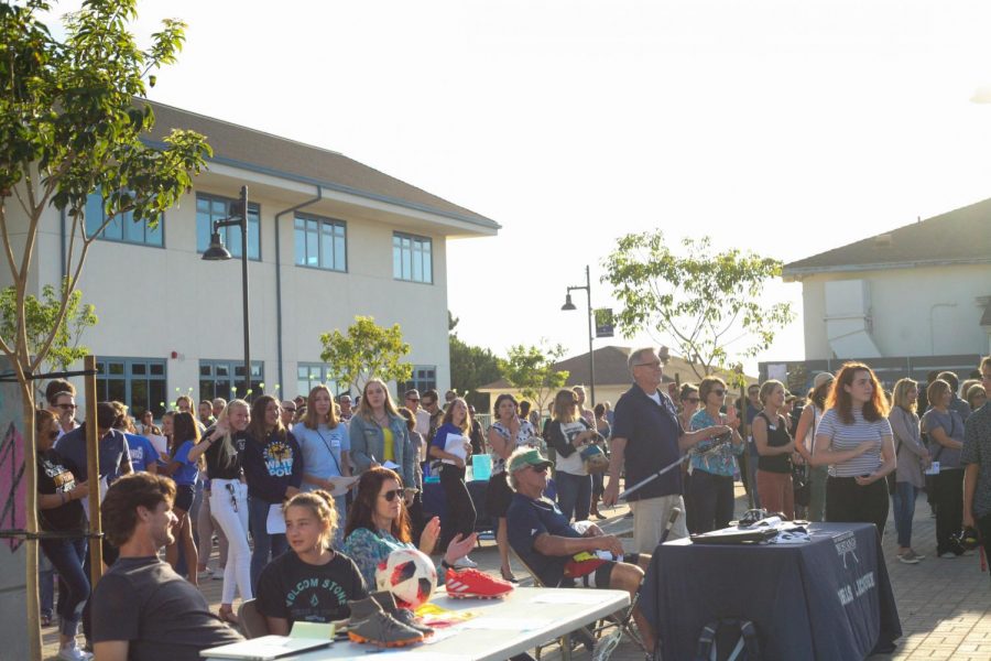 Parents and student representatives gather in the Arts and Humanities building quad.