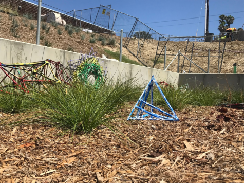 Student-made sculptures are scattered throughout campus.