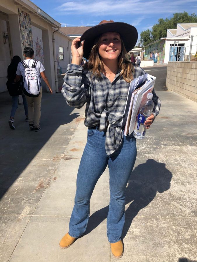 Junior Olivia Alcantar wear denim and a flannel.