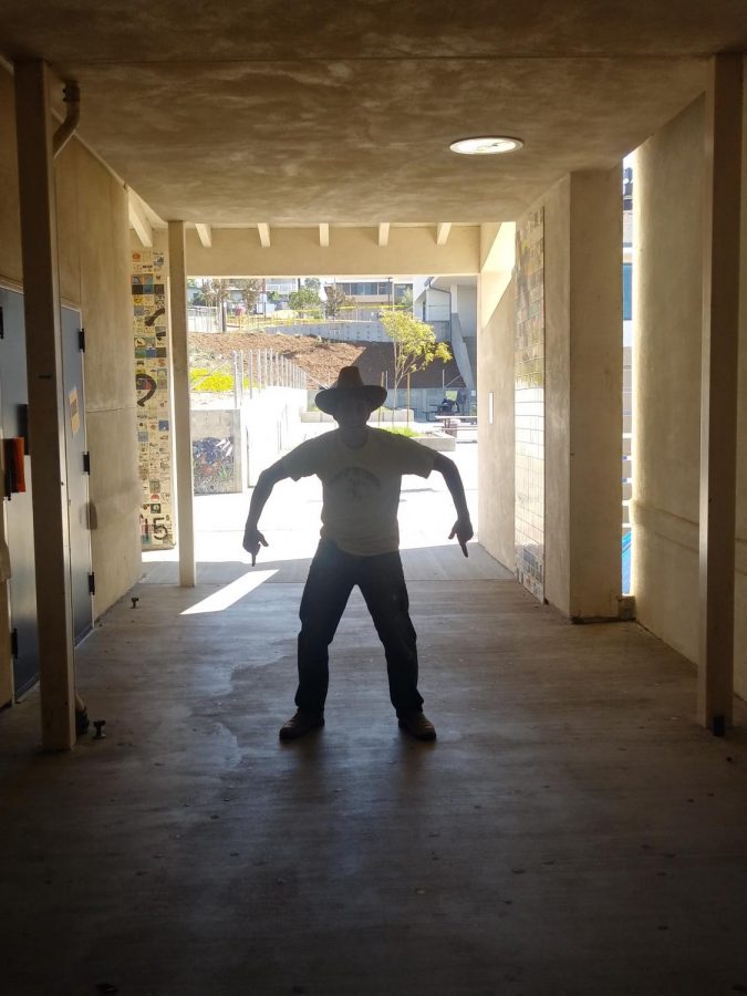 Art teacher Jeremy Wright prepares for a stand-off in the hallway.