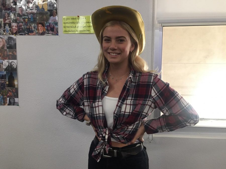 Junior Shayne Hougard in a flannel and hat.