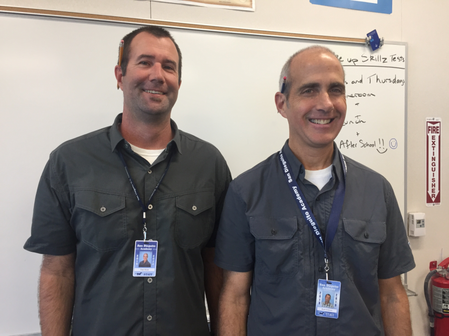 Math teachers Bryan Anderson and Paul Brice matching.