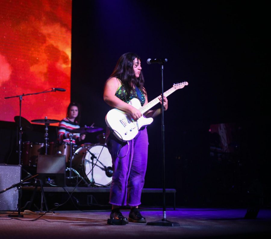 Senior Nina Tartibi of Chalk Talk on vocals and guitar.