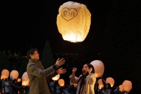 Peter and Lara Jean releasing a lantern as a symbol of their love on their first official date as a couple.