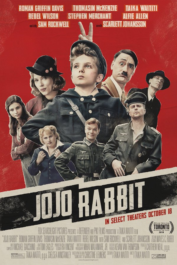 Jojo+Betzler+%28Roman+Griffin+Davis%29+and+his+imaginary+friend+Adolf+Hitler+%28Taika+Waititi%29+run+through+a+forest.