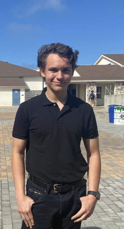 Junior Logan Picunko shows school spirit on monochrome day.