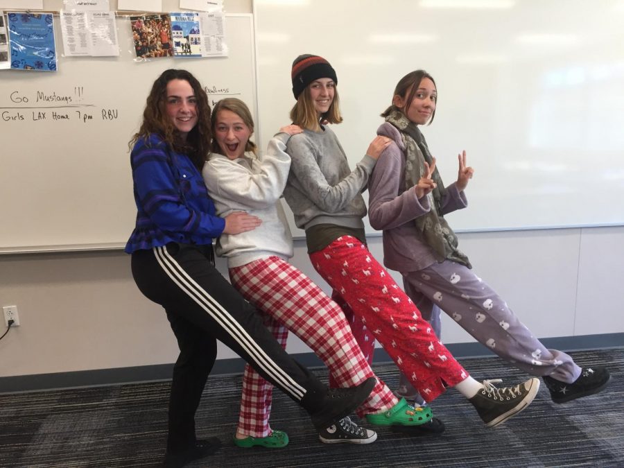 Left to right: juniors Caolinn Hukill, Grace Keefe, Isabella Weaver, and senior Malou Le Boursicaud 