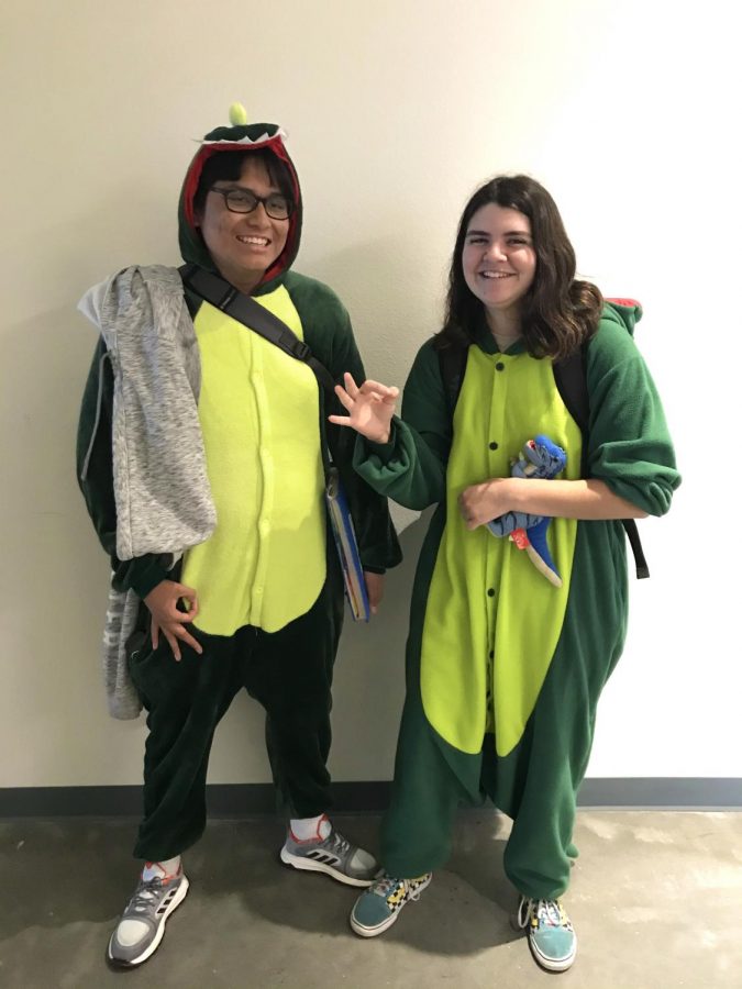 Dinosaurs - sorry wait, freshman Xander Garcia and Cece Ramierez show off their onesies.