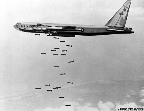 A US Air Force plane dropping bombs over Cambodia. 