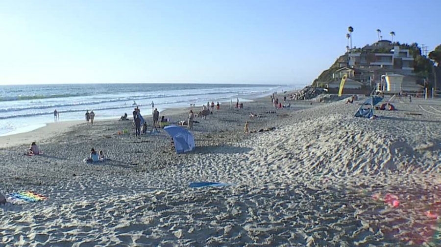 San Diego beaches have began to open up-- with restrictions.