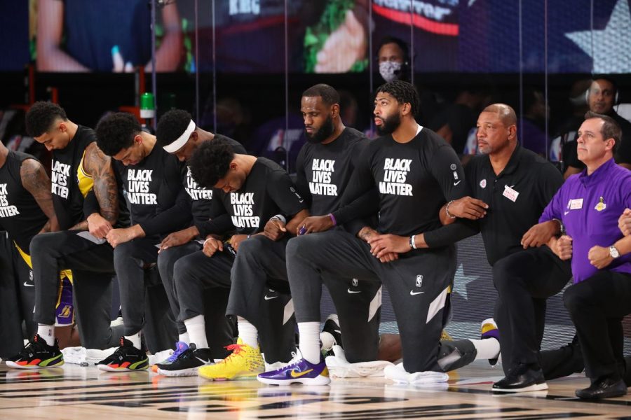 Lakers, Clippers, Pelicans, and Jazz all took a knee for the anthem for the NBA restart on Jul 30, 2020