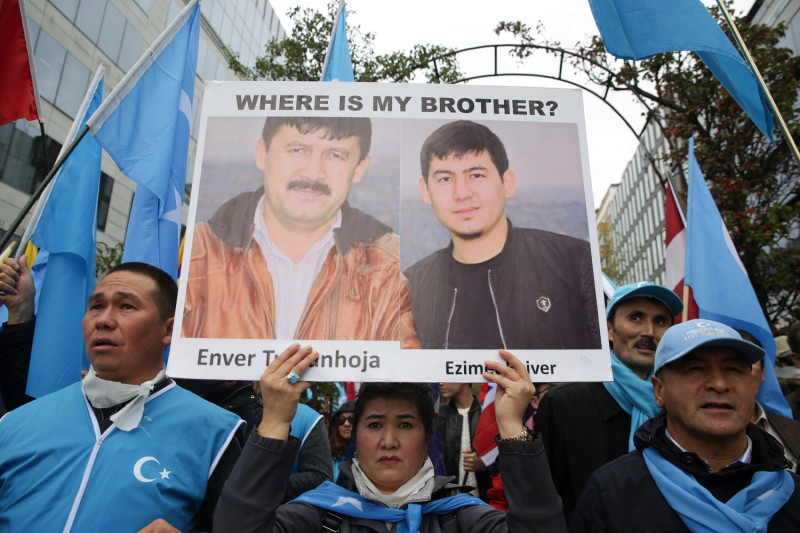 Protestors take part in Brussels, on October 1, 2019 on the day of the 70th anniversary of the establishment of the Peoples Republic of China, in a protest organized by the World Uyghur Congress, the International Campaign for Tibet, the Unrepresented Nations and Peoples Organisation, the Belgian Uyghur Association and the Tibetan Community in Belgium.