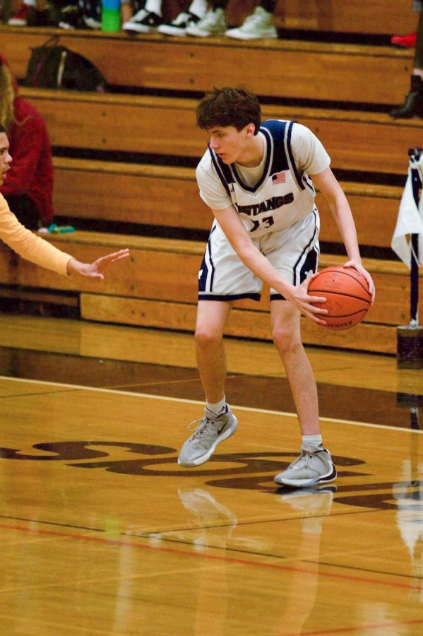 Senior Matthew Schwartz playing in a basketball game for SDA