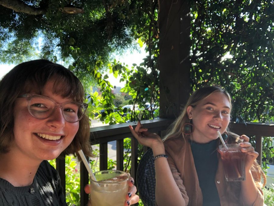 Junior Skyler Martin  drinking a nice, cool drink while hanging out with a friend