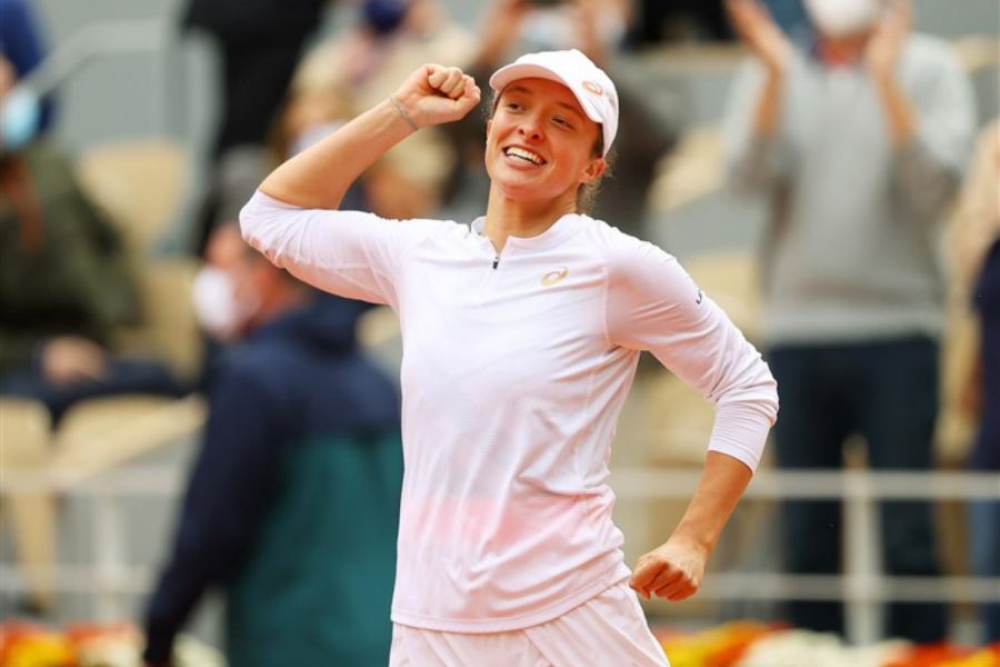 Iga Swiatek of Poland celebrates after winning the championship point at the French Open on Oct. 10, 2020