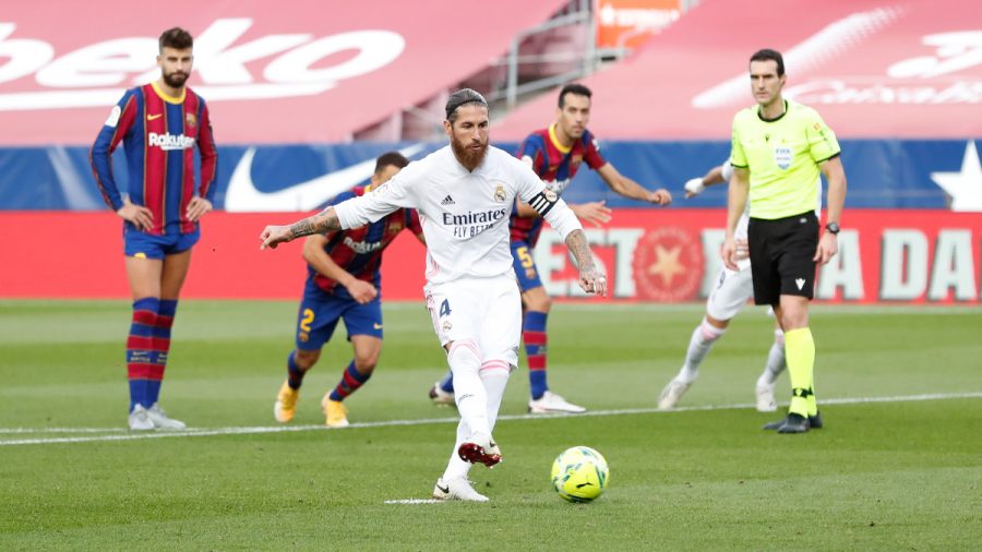 Sergio Ramos scores a penalty, securing the lead for Madrid