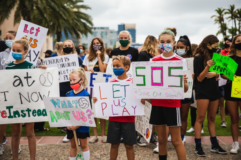 Youth soccer players rally in front of San Diego County Administration Center Oct.10, 2020