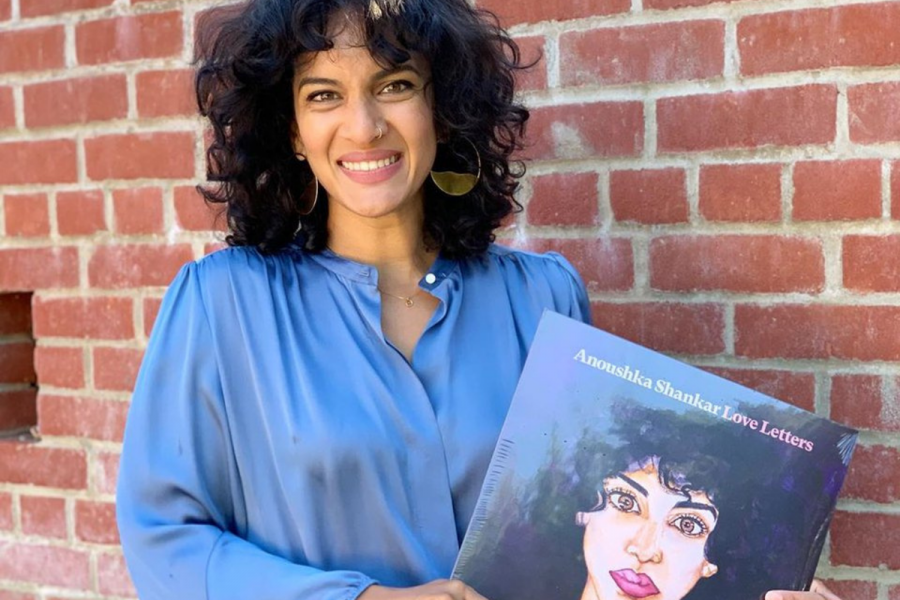 San+Dieguito+Academy+alumna+Anoushka+Shankar+poses+with+her+newest+EP+Love+Letters+on+a+vinyl+record+on+Aug.+29%2C+2020