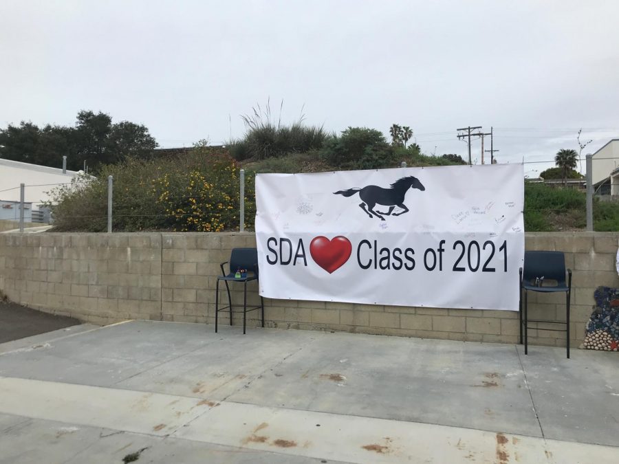 Class of 2021 banner near the art building and textbook pick up area