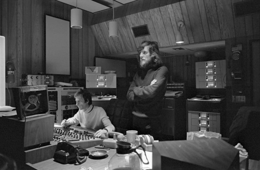 British singer-songwriter Graham Nash (right) listens to recordings from his debut album Songs for Beginners in early 1971
