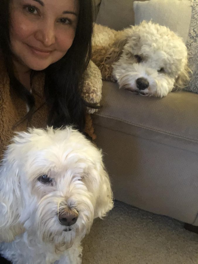 Spanish teacher Ivonn Barriga with her dogs Wrigley and Kona