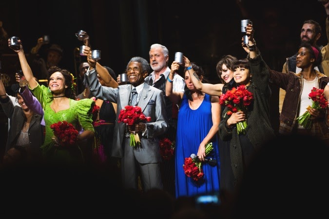 The company of Hadestown celebrating their reopening.