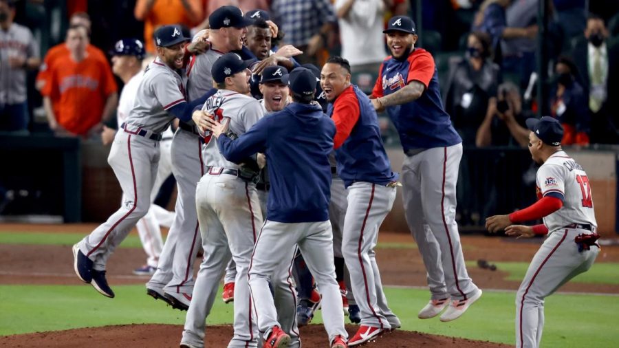 Braves Players celebrate after defeating the Astros 7-0 in game six to win the World Series. 