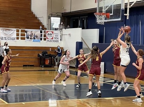 Senior Piper Ligotti shoots contested jumpshot