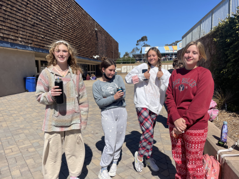 Freshmen Taylor Belanich, Isabella Zumot, Jovia Gutierrez, and Penelope Rolley hanging out in their pajamas during lunchtime.