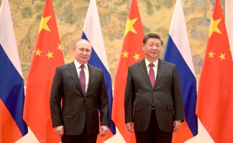 Russian President Vladimir Putin and Chinese leader Xi Jinping meet before the 2022 Beijing Olympics.