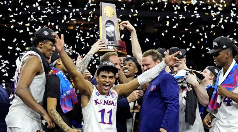The Championship Trophy is hoisted for the victorious Kansas Jayhawks basketball team.
